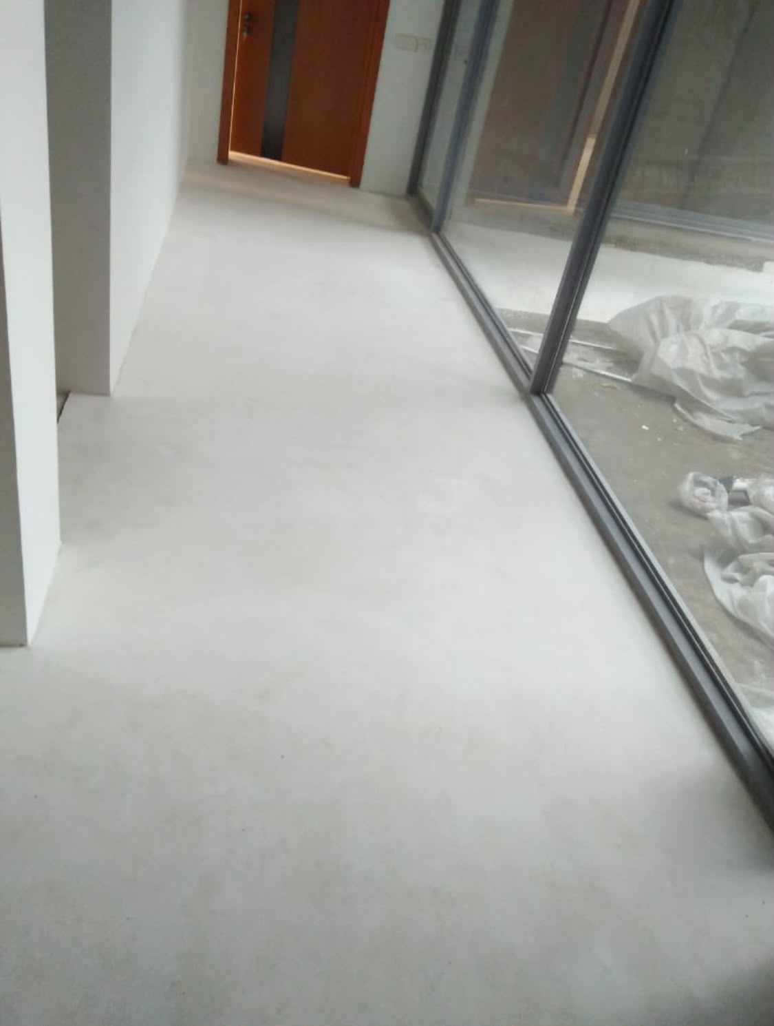 Micro cement flooring system — project photo 1